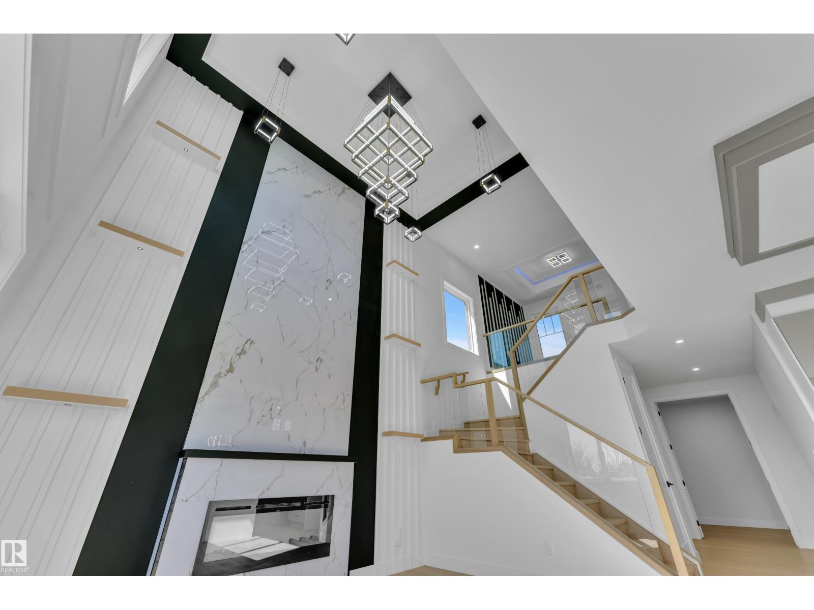 Representative great room fireplace feature wall, upper angle, at this finish level