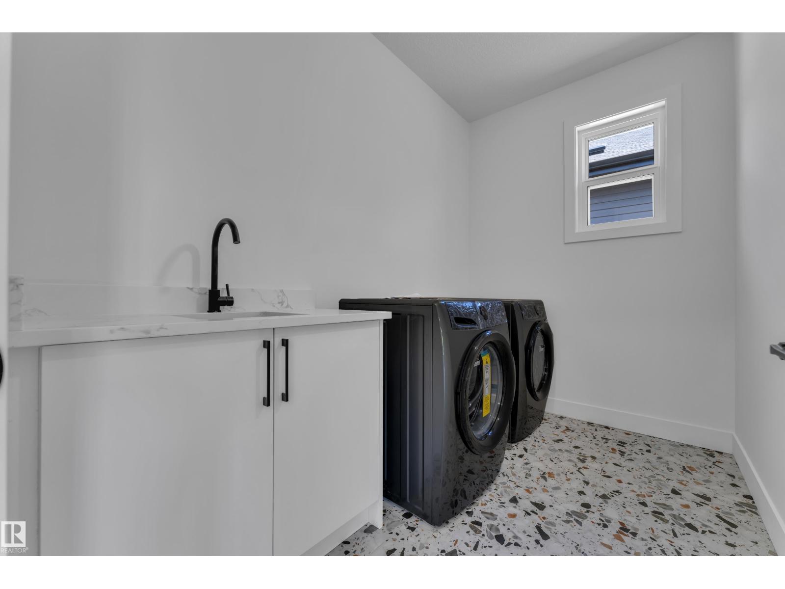 Representative laundry room with terrazzo floor, at this finish level
