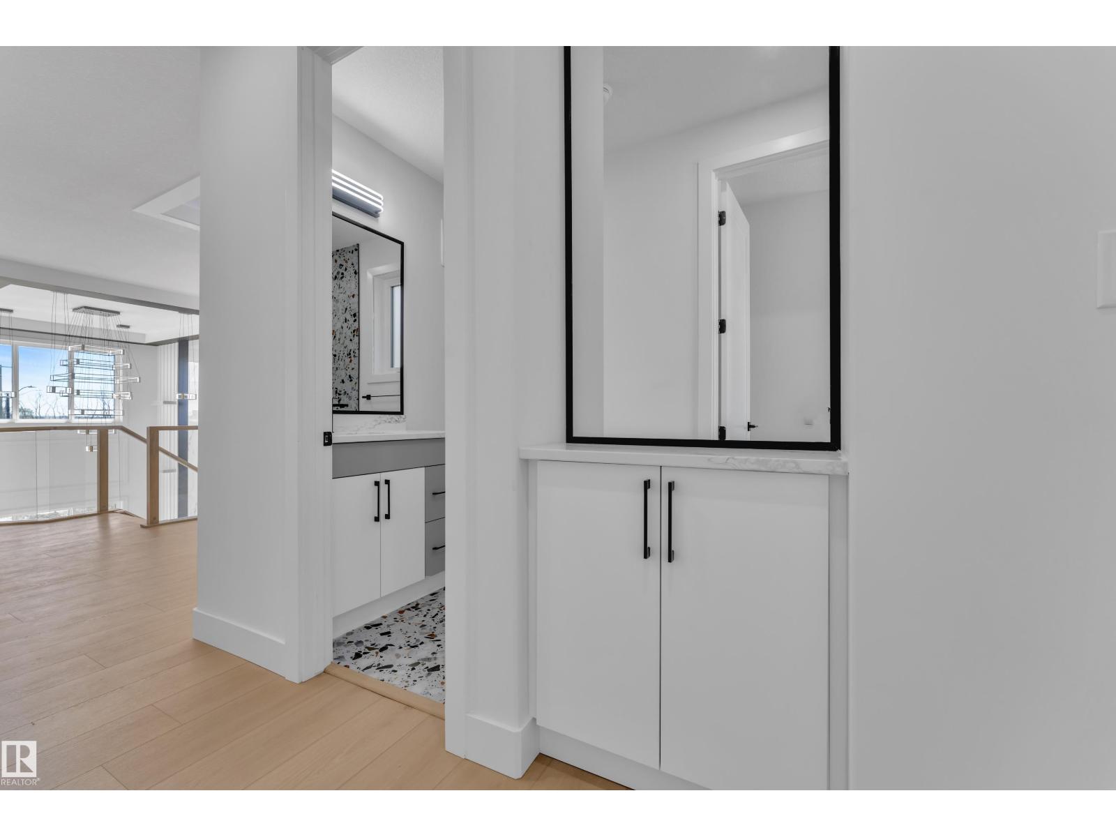 Representative upper hallway with double vanity, at this finish level